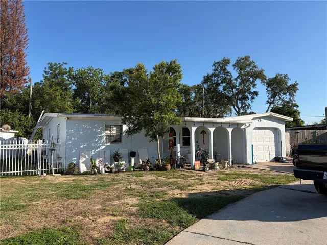 Front of property from left side of circular driveway