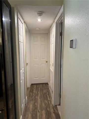 Hallway to 2 bedrooms and 2nd bathroom