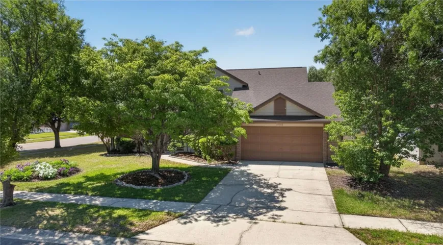 Extended driveway provides room for multiple vehicles