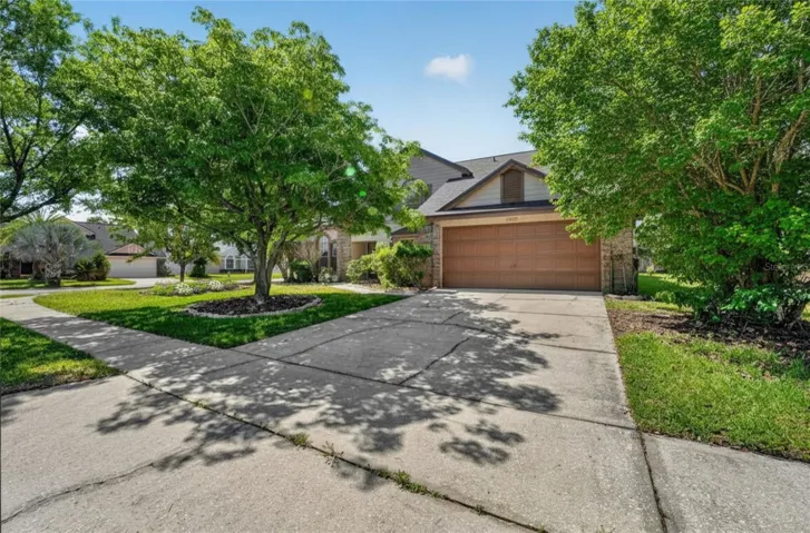 Welcome to this exceptionally maintained 4 bedroom, 2 and 1/2 bath East Orlando home!