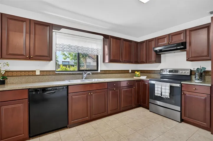 Newer appliances, a window over the sink and attractive updates makes mealtime - and cleanup - extra enjoyable