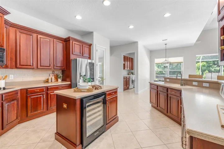 Gourmet kitchen offers center island and generous prep space
