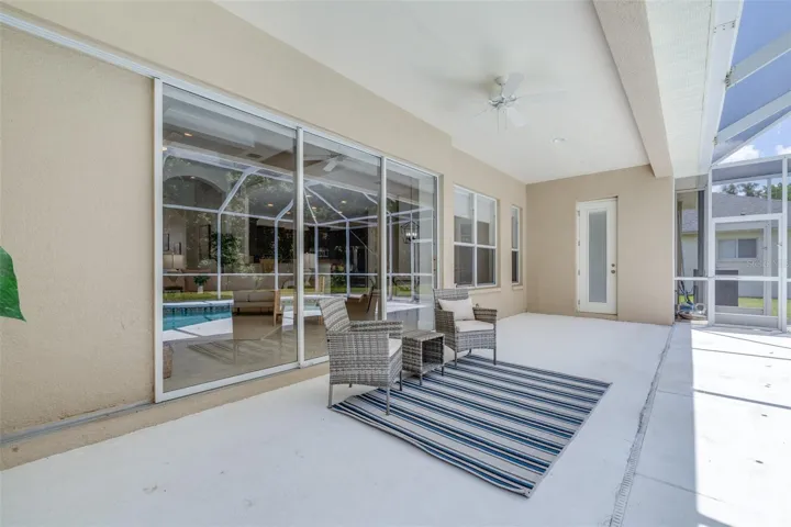 Spacious covered patio with seamless access to the indoor living areas