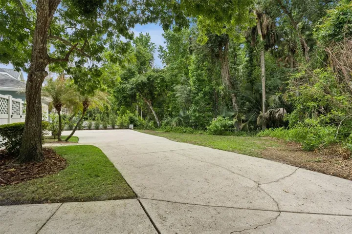 Private driveway with conservation land.