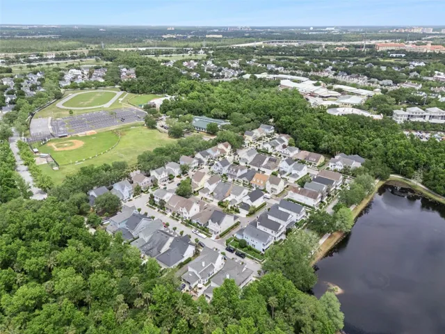 Between the lake and sports fields.