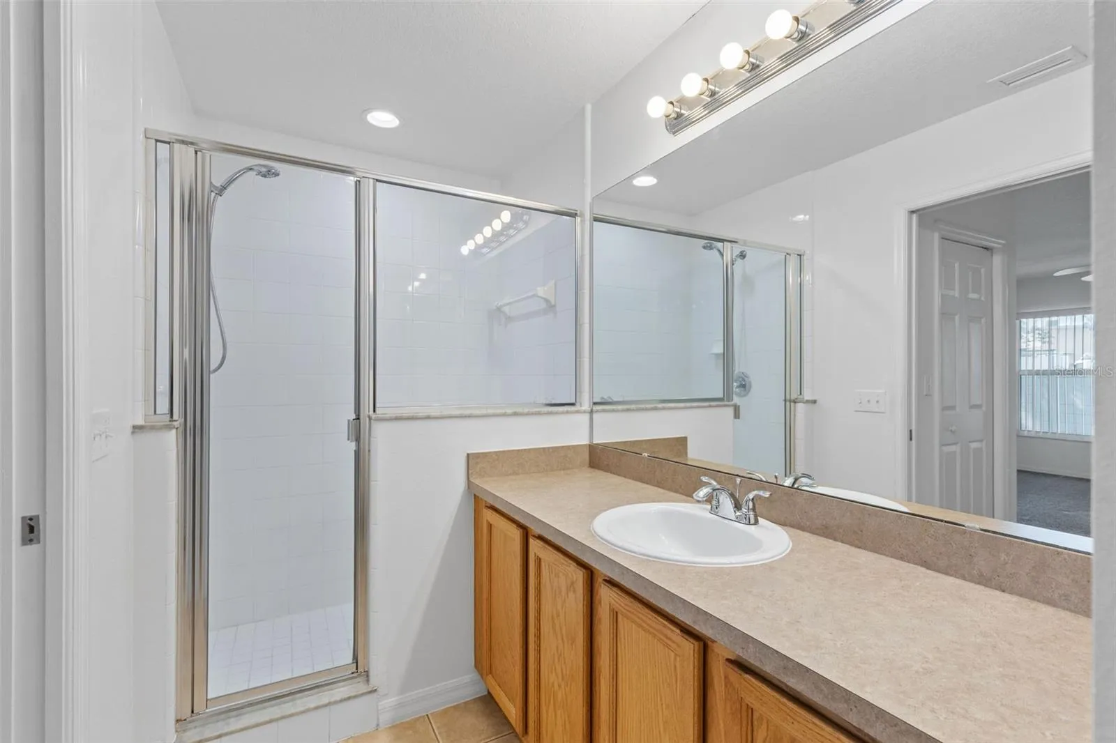 Downstairs Primary bathroom with walk-in shower
