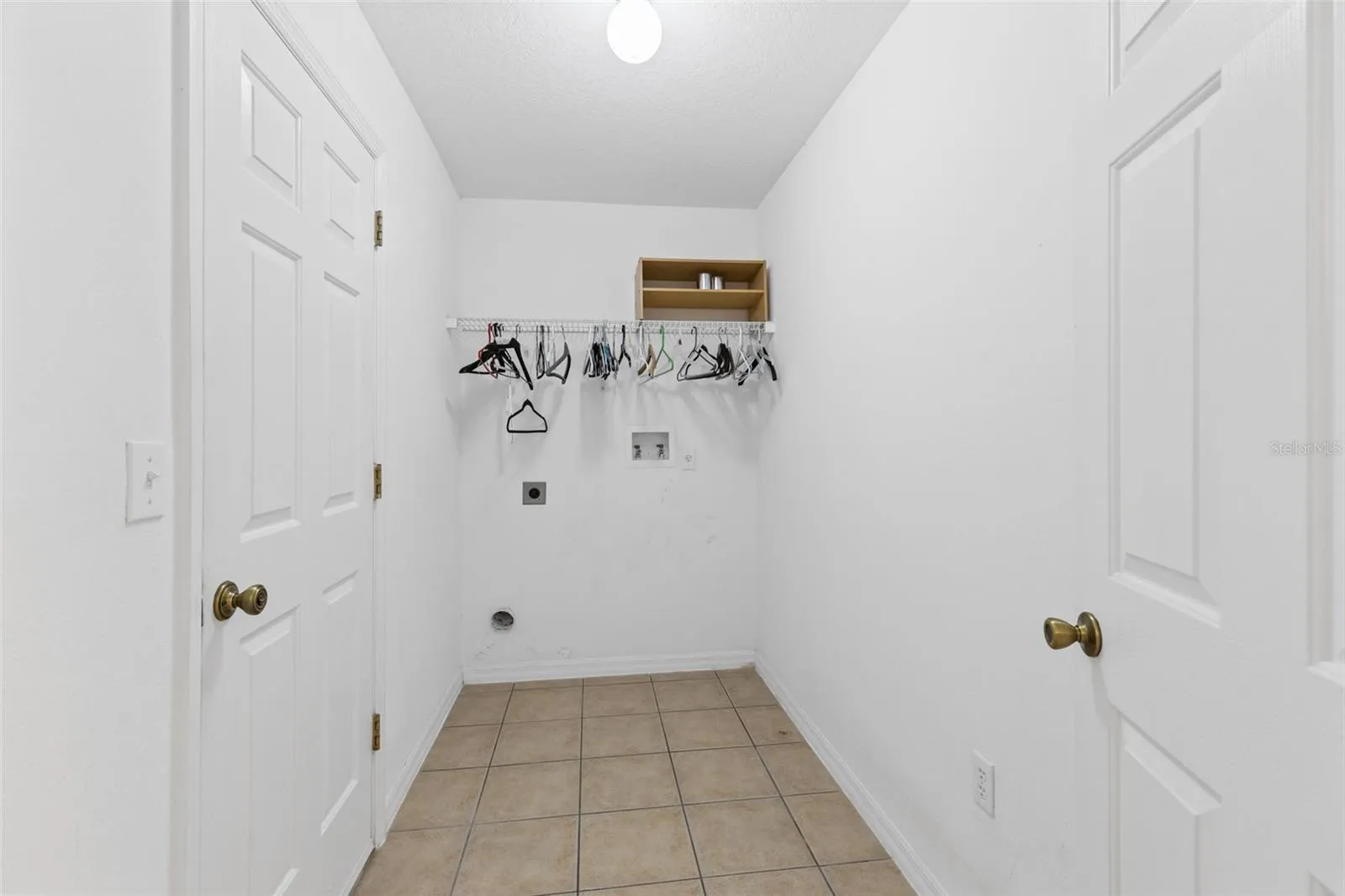 Downstairs laundry room off garage