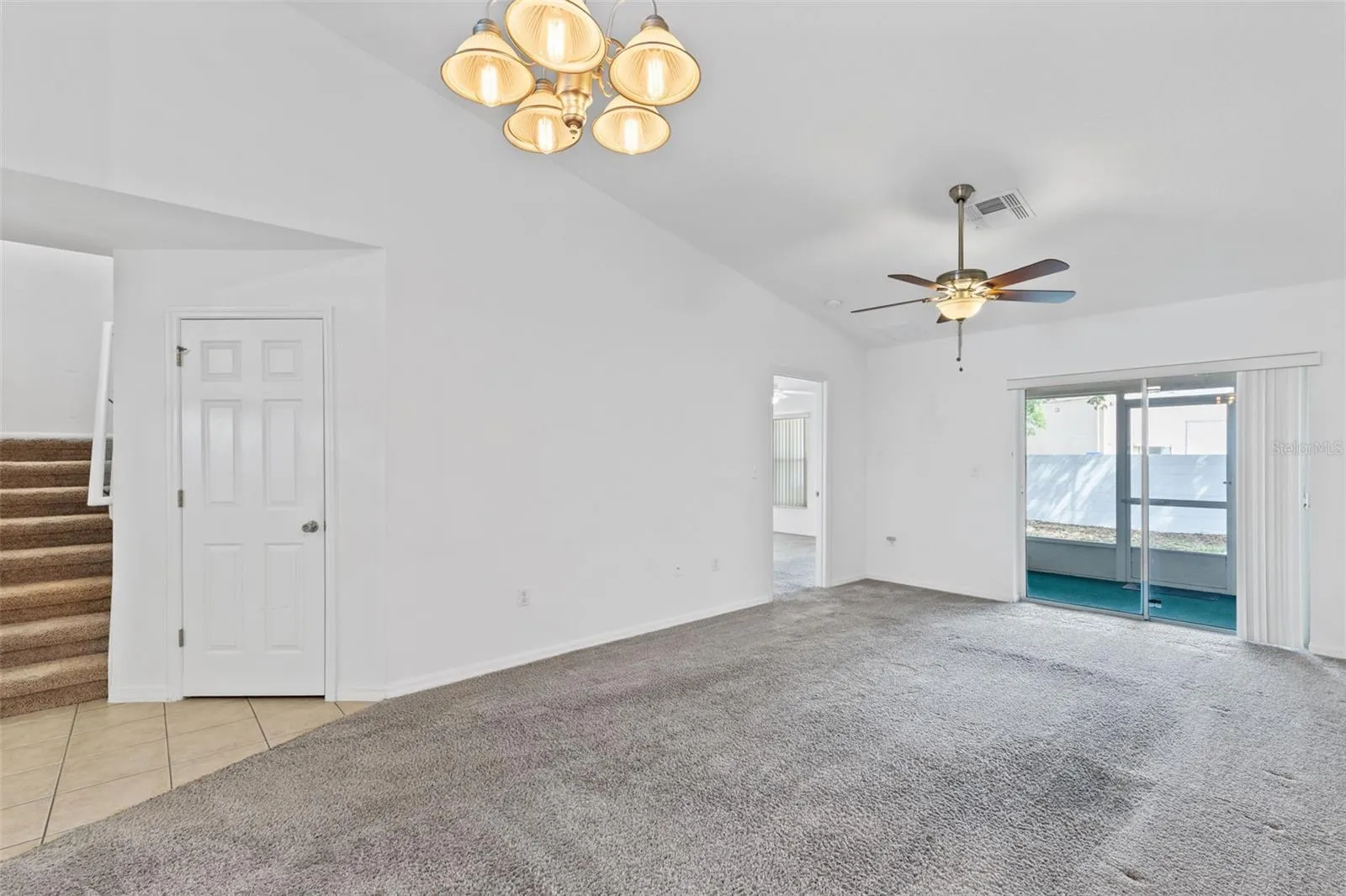 Living/Dining area with access to rear screened patio