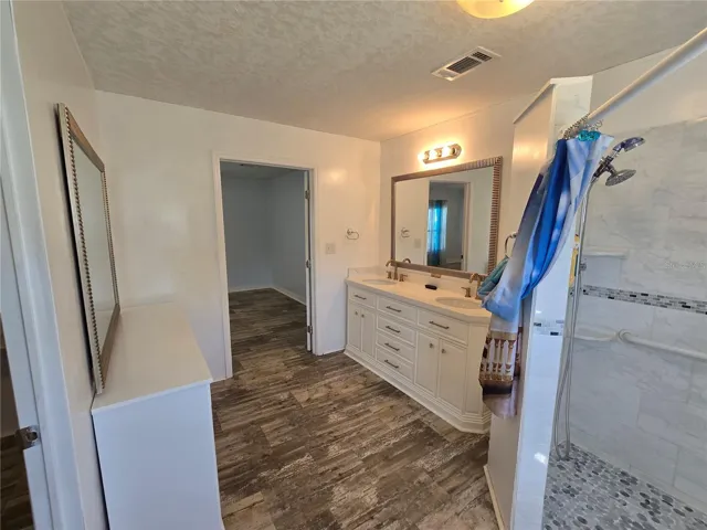 Bathroom door opens outward to allow more clearance into bathroom.