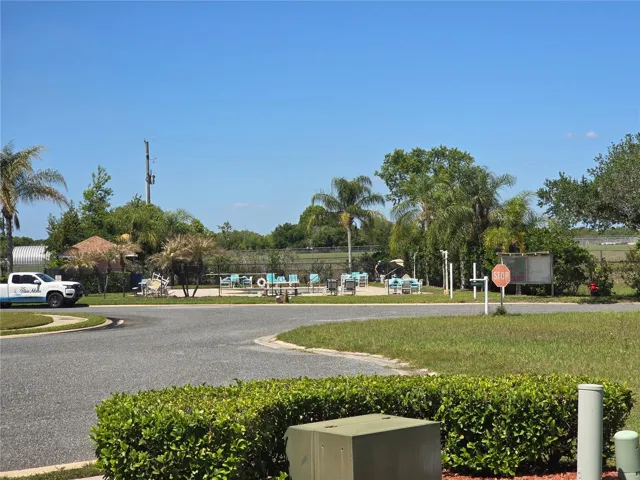 Across from community pool and clubhouse.