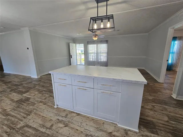 New center island, storage, shelving & seating. Great room.