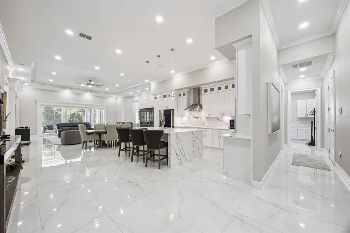 Open layout of living room, dining room and kitchen