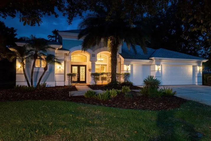 4/3 with a pool, spa and 3-car garage in Lansbrook!