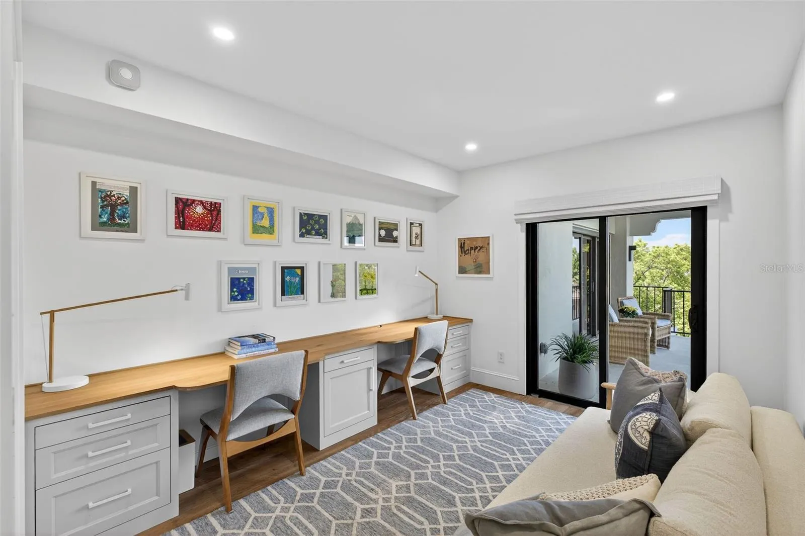 The third bedroom offers sliding glass doors to the balcony for natural light and an outdoor connection, along with a customized closet for added style and function.