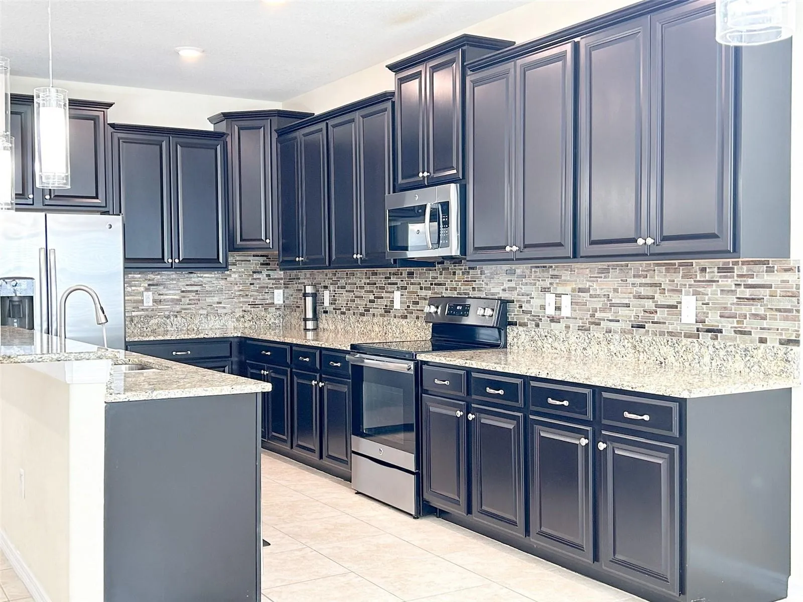 42-inch espresso cabinets and granite counters