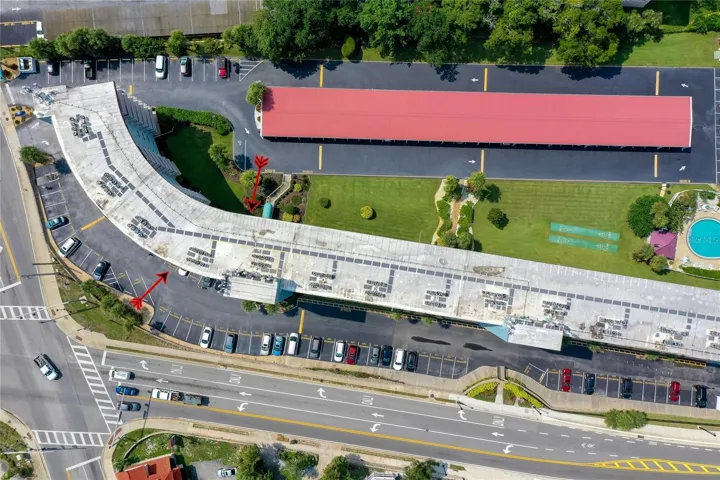 Top-down perspective illustrating the full layout of the community, including amenities and shoreline access.