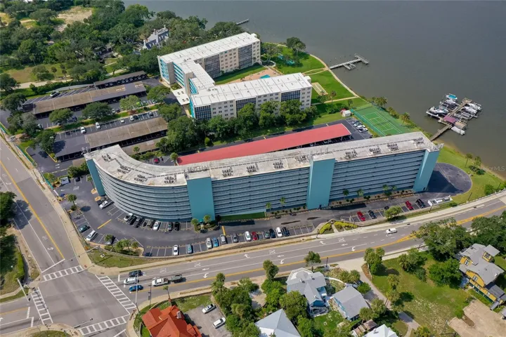 Wide aerial angle capturing the full building footprint and convenient location near major roadways and the water.