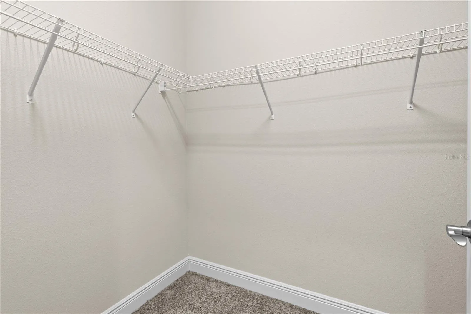 downstairs huge master walk-in closet