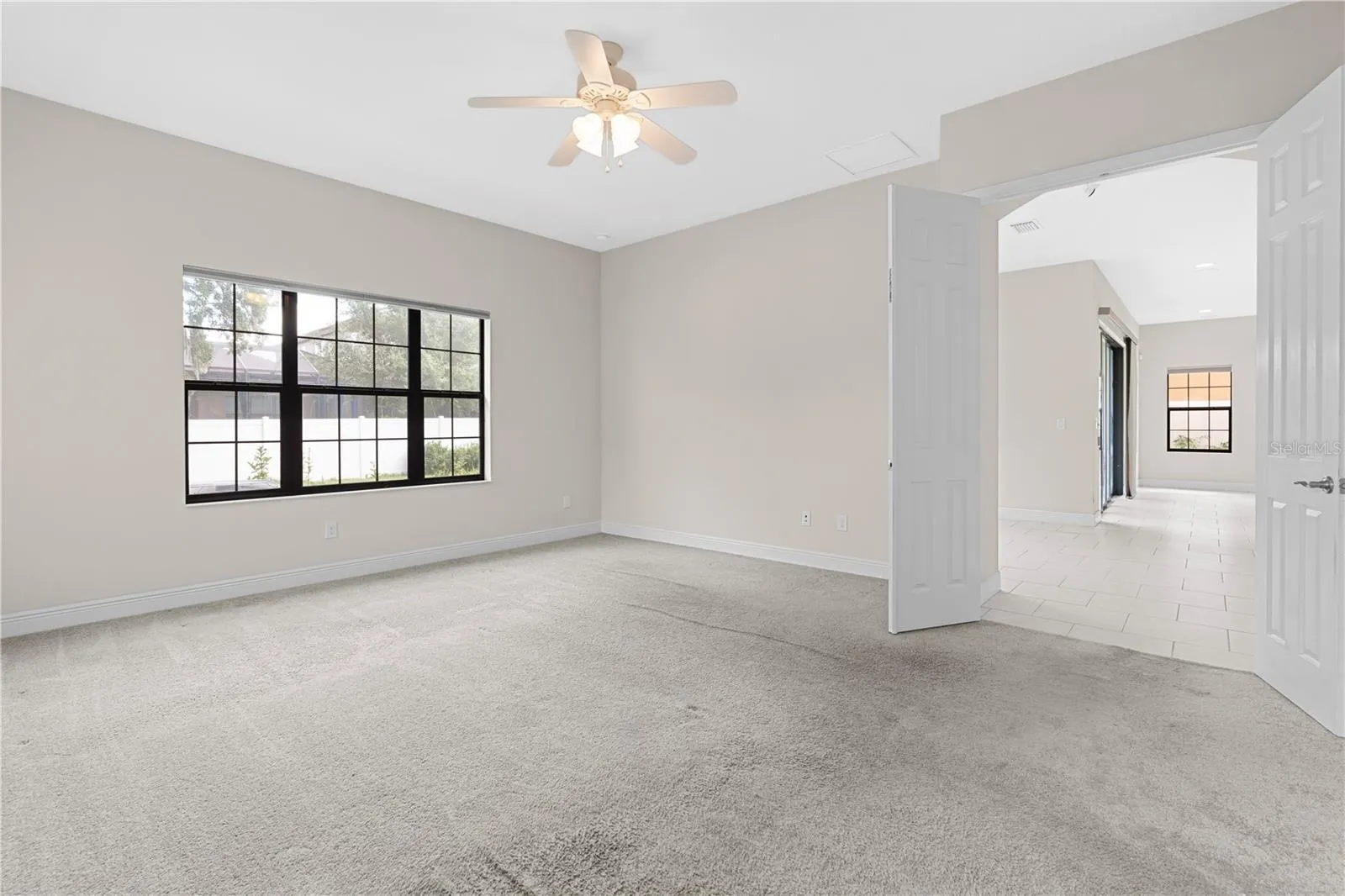 downstairs master bedroom with french doors