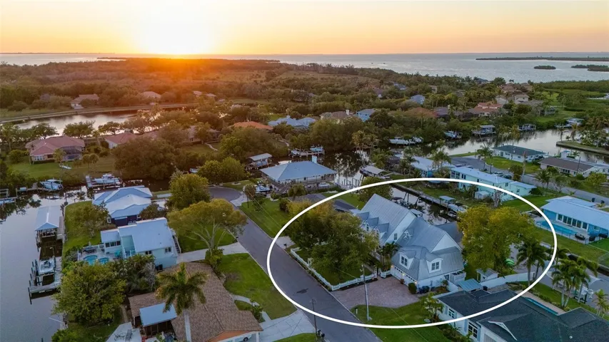 Refined coastal design meets effortless boating access just minutes to Terra Ceia Bay and Tampa Bay