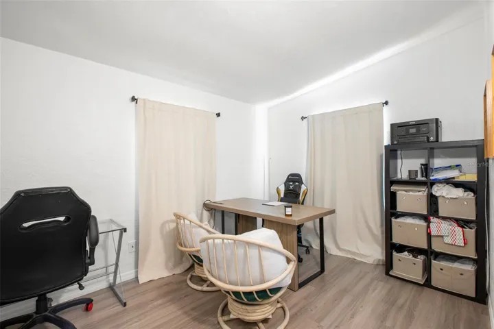 Well-sized secondary bedroom offers versatility for guests, office, or hobbies.