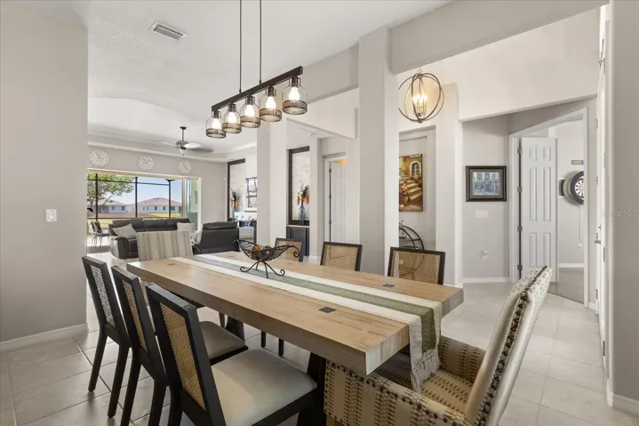 Large 8 person dining set up perfect for gathering and entertaining.