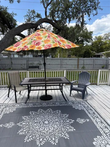 Wood patio. Back yard faces Union for potential driveway/garage. Check with zoning first.