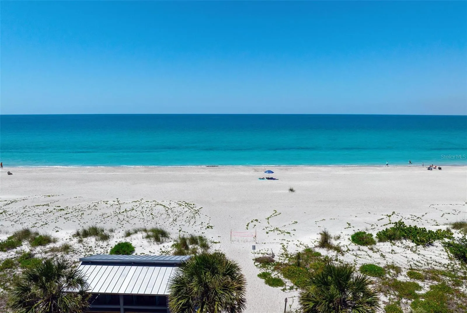 Closer drone view of your private beach.