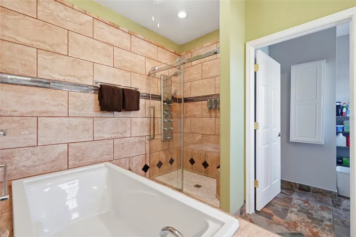 primary bath - garden tub and stand alone shower