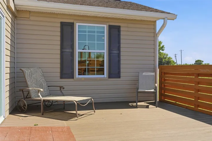 spacious patio area off of the pool area