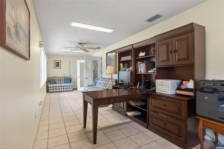 Second family room. Exit to the back patio on the far wall.