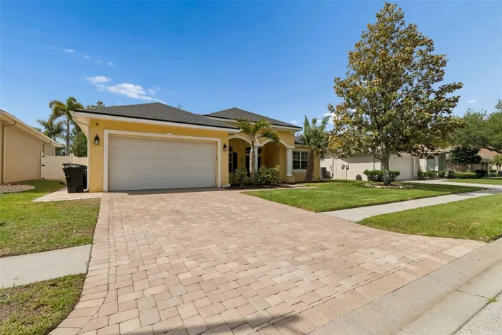 Paver drive and sidewalks...within a serene community...plenty area area for walking!