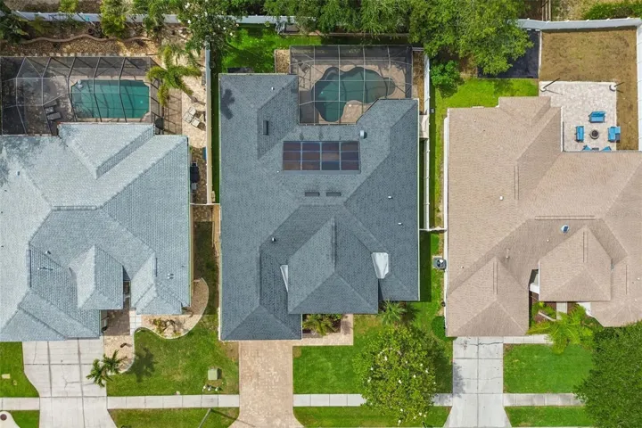 Notice the "integrated solar roof"? The solar does NOT have to be removed when the rest of the shingles need to be replaced...much better than panels and PAID OFF!