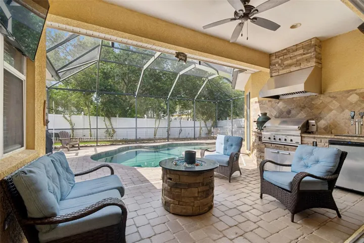 Enjoy time around the firepit or throw something on the grill! This outdoor kitchen is sure to please!
