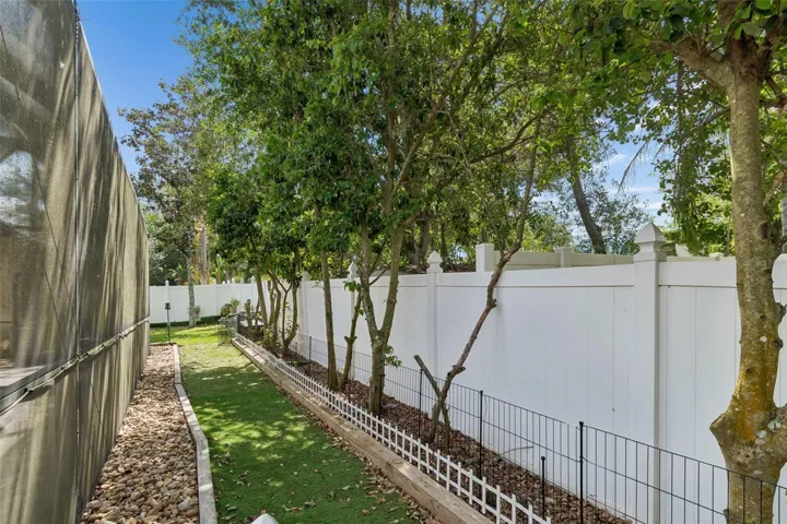 Dog run with artificial turf.