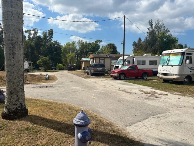 Following road around park- 1st left to Laundry