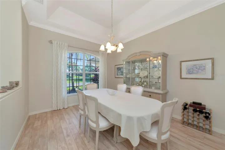 Front dining room 11.5 x12 w/ tray ceiling.