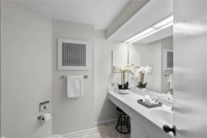 Half bath in the front of the unit