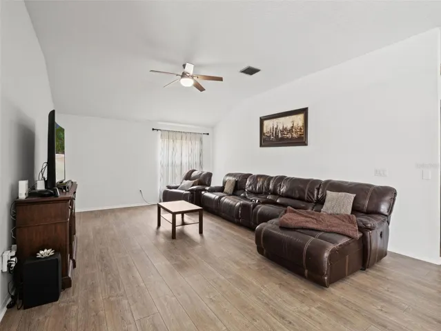 Bright and open secondary living space with clean lines and neutral tones, easily adaptable to suit a variety of lifestyles.