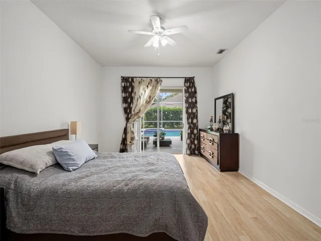 Generous layout with ample wall space and natural light, offering flexibility for additional seating or a cozy reading nook.