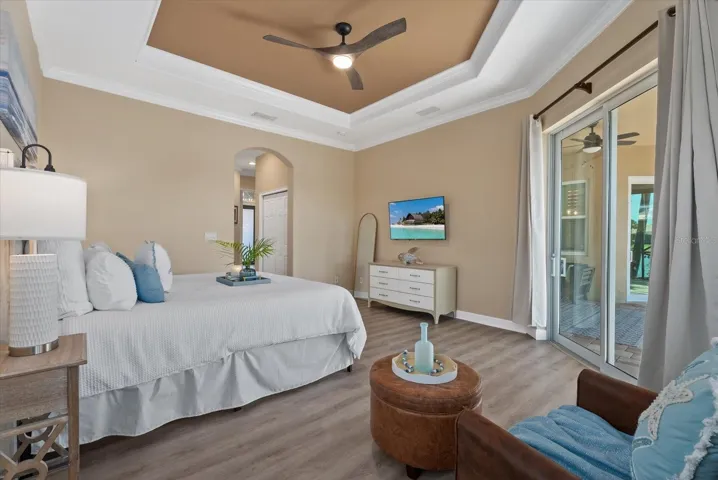 Primary bedroom with dual walk-in closets