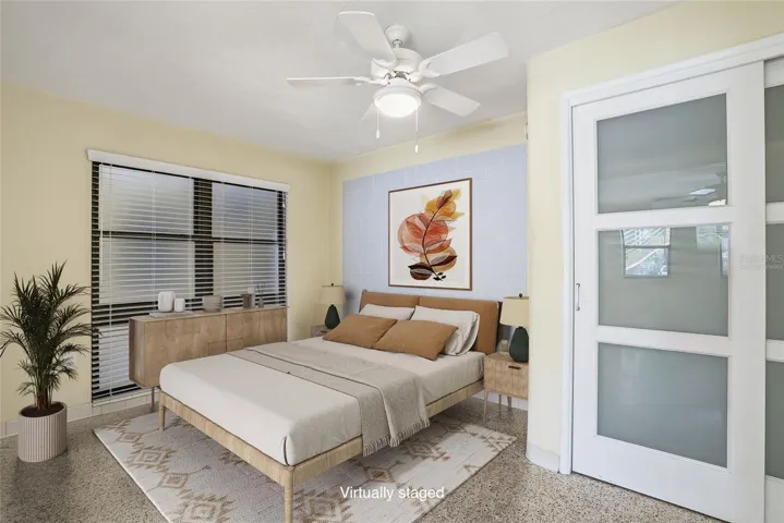 Virtually staged bedroom with closet.
