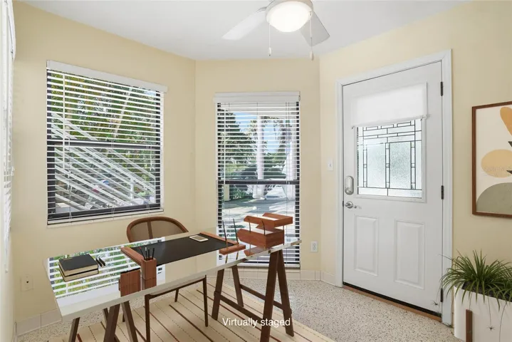 Virtually staged office upon the front entry.