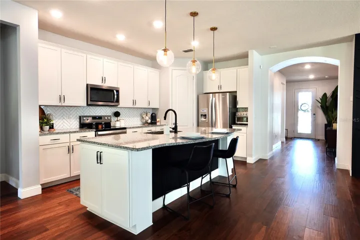 Spacious foyer leading you into the open concept living areas.