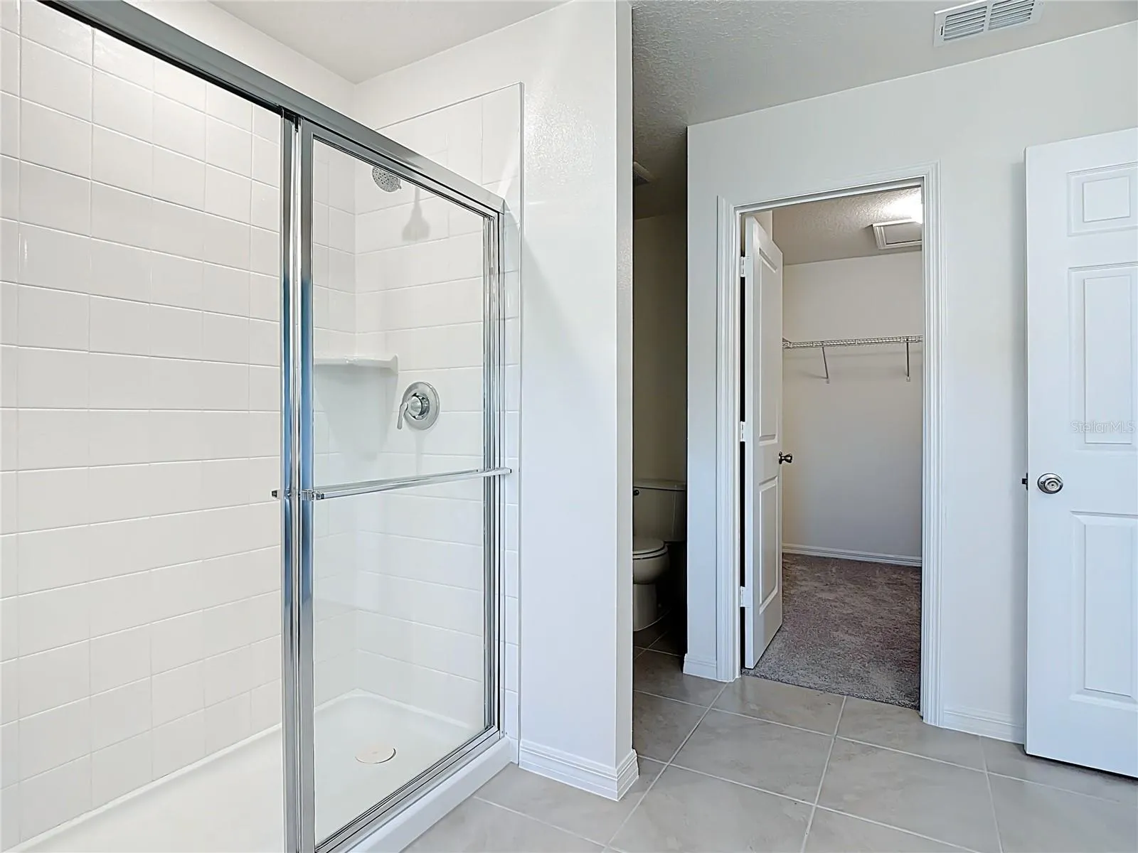 Owner's suite with generous walk-in closet