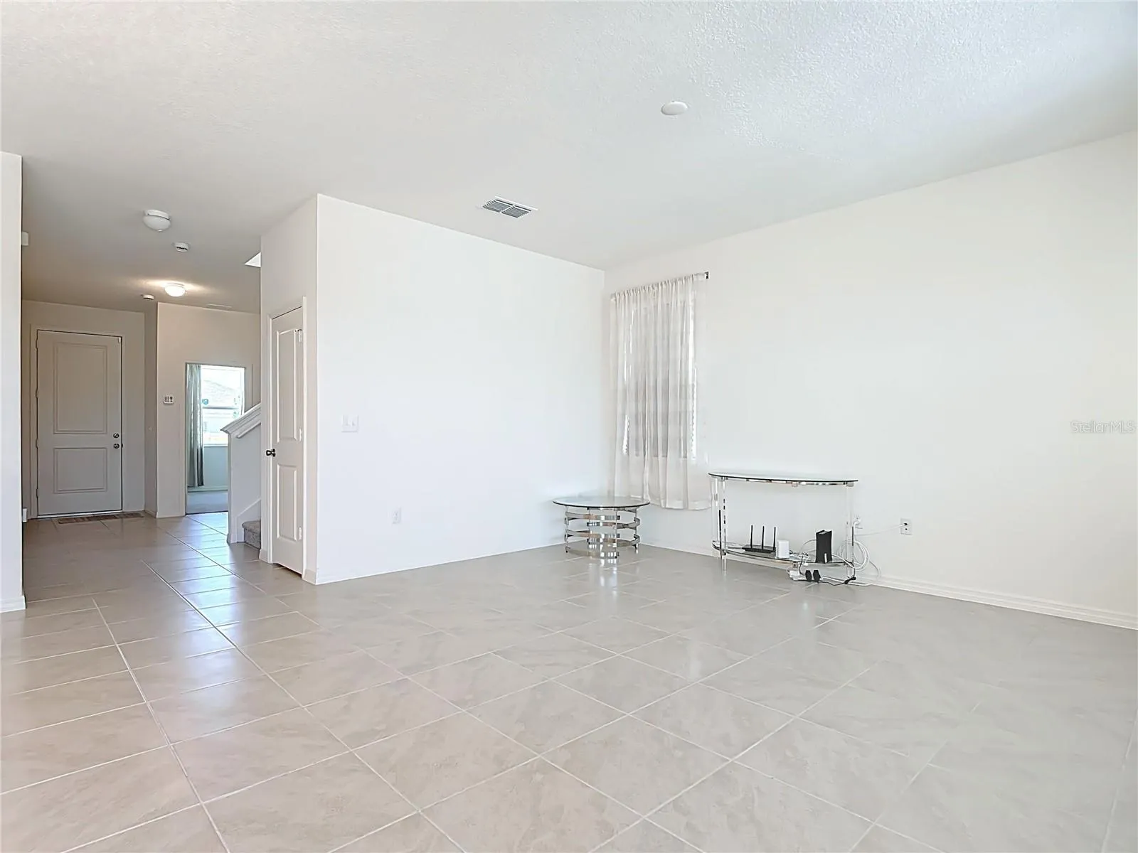Welcoming Foyer & Living Room area