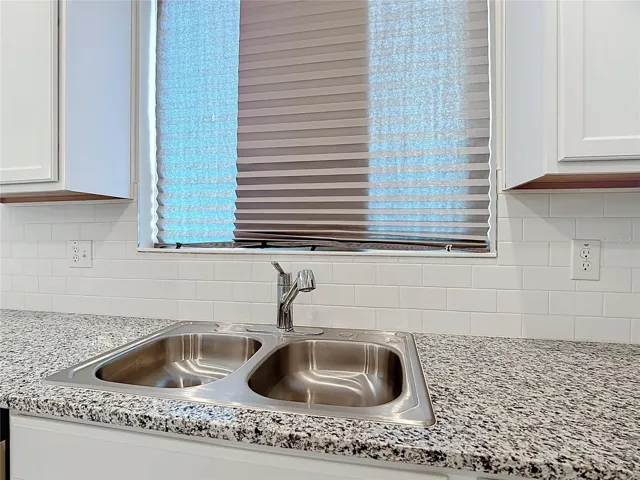Kitchen sink overlooking outside