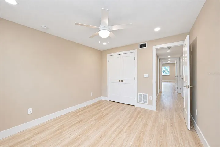 Secondary bedroom with walk in closet