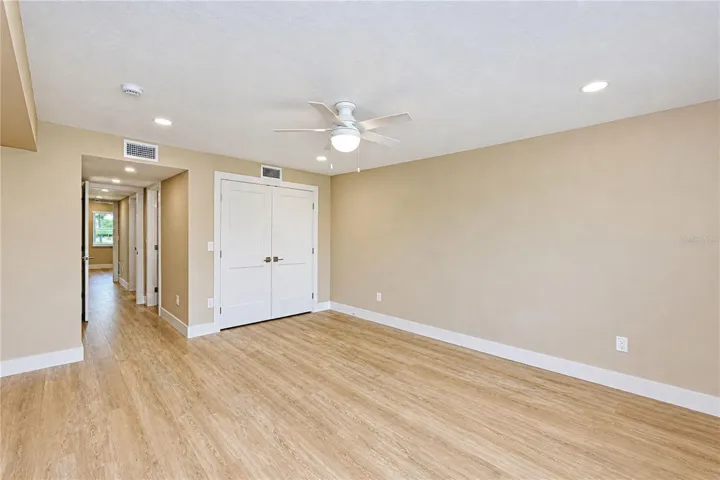 Primary bedroom offers ensuite and two large closets