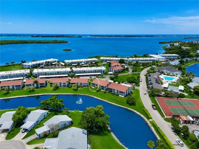 Aerial view of condo in bay front community